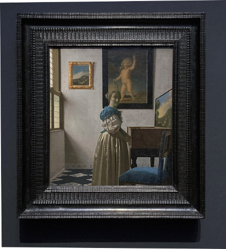 Johannes Vermeer's A Lady Standing at a Virginal with frame